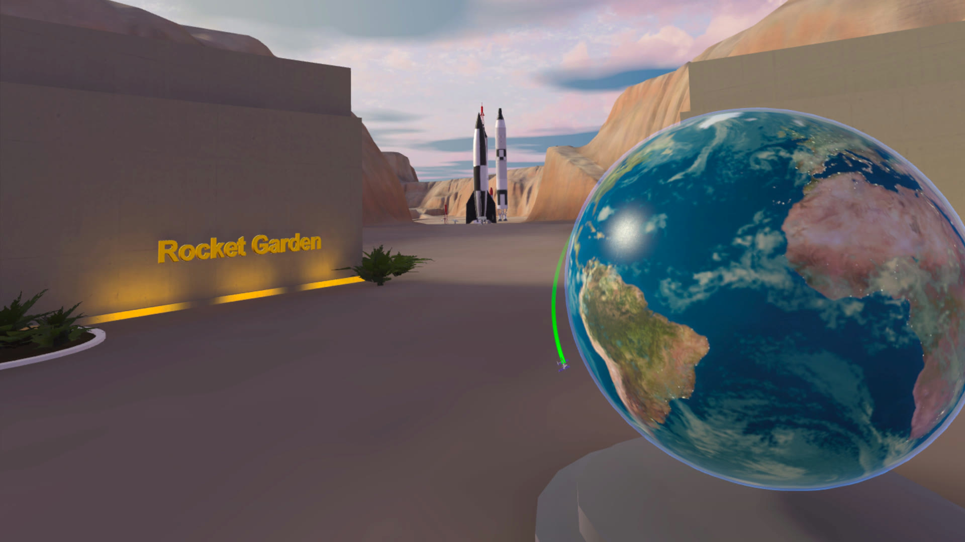 Entrance of the Rocket Garden with a scaled Earth showing the live position of the ISS, rockets in the distance