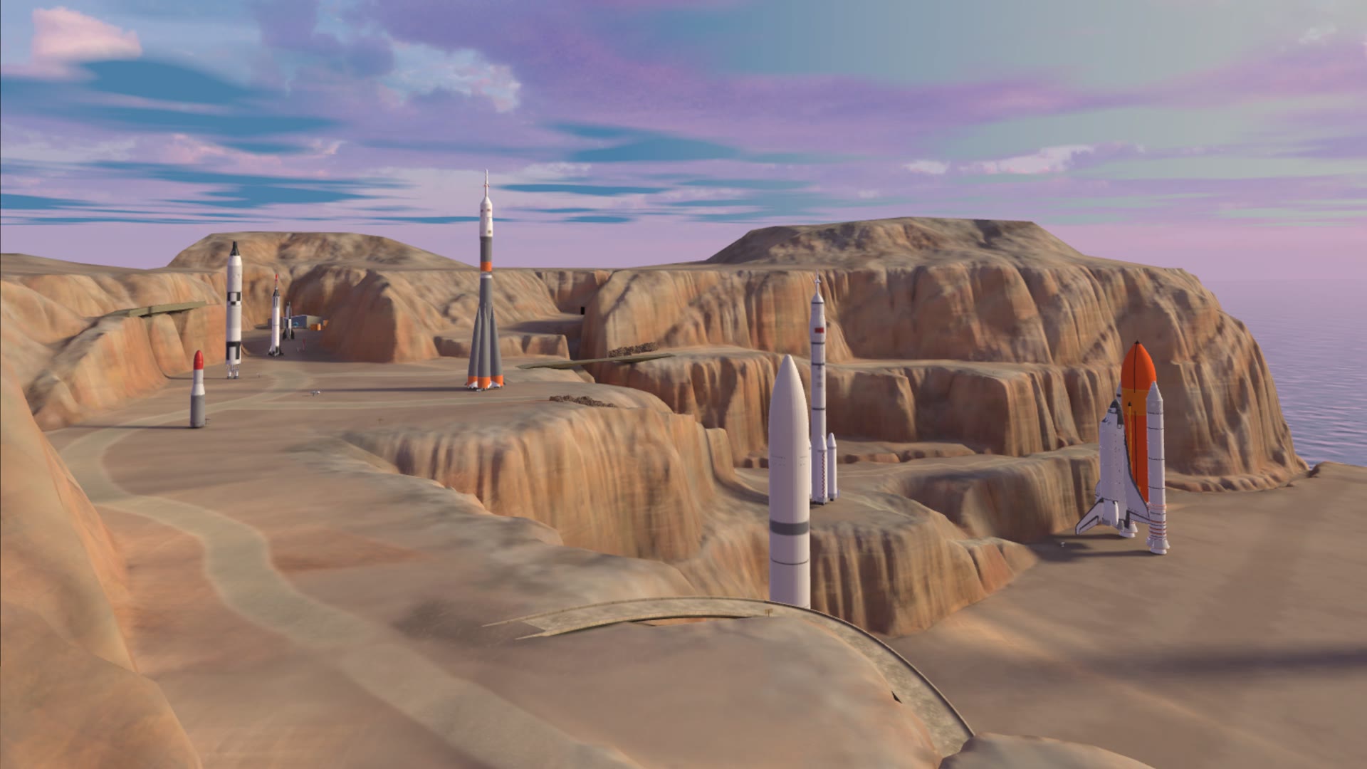 Overview of the canyon park with several rockets and the Space Shuttle